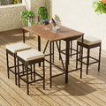 519021441, acacia wood bistro table with rattan wicker legs and rattan brown wicker bar height stools with white cushions